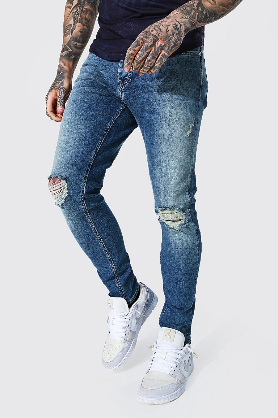 Jeans skinny elasticizzati effetto consumato con strappi alle ginocchia, Azzurro vintage image number 1