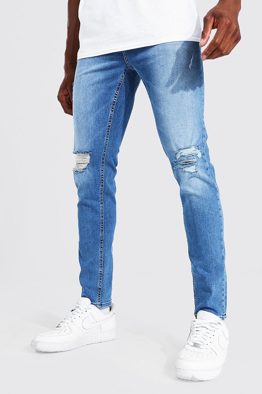 כחול ביניים סקיני ג'ינס מבד נמתח עם קרעים גדולים בברכיים image number 1