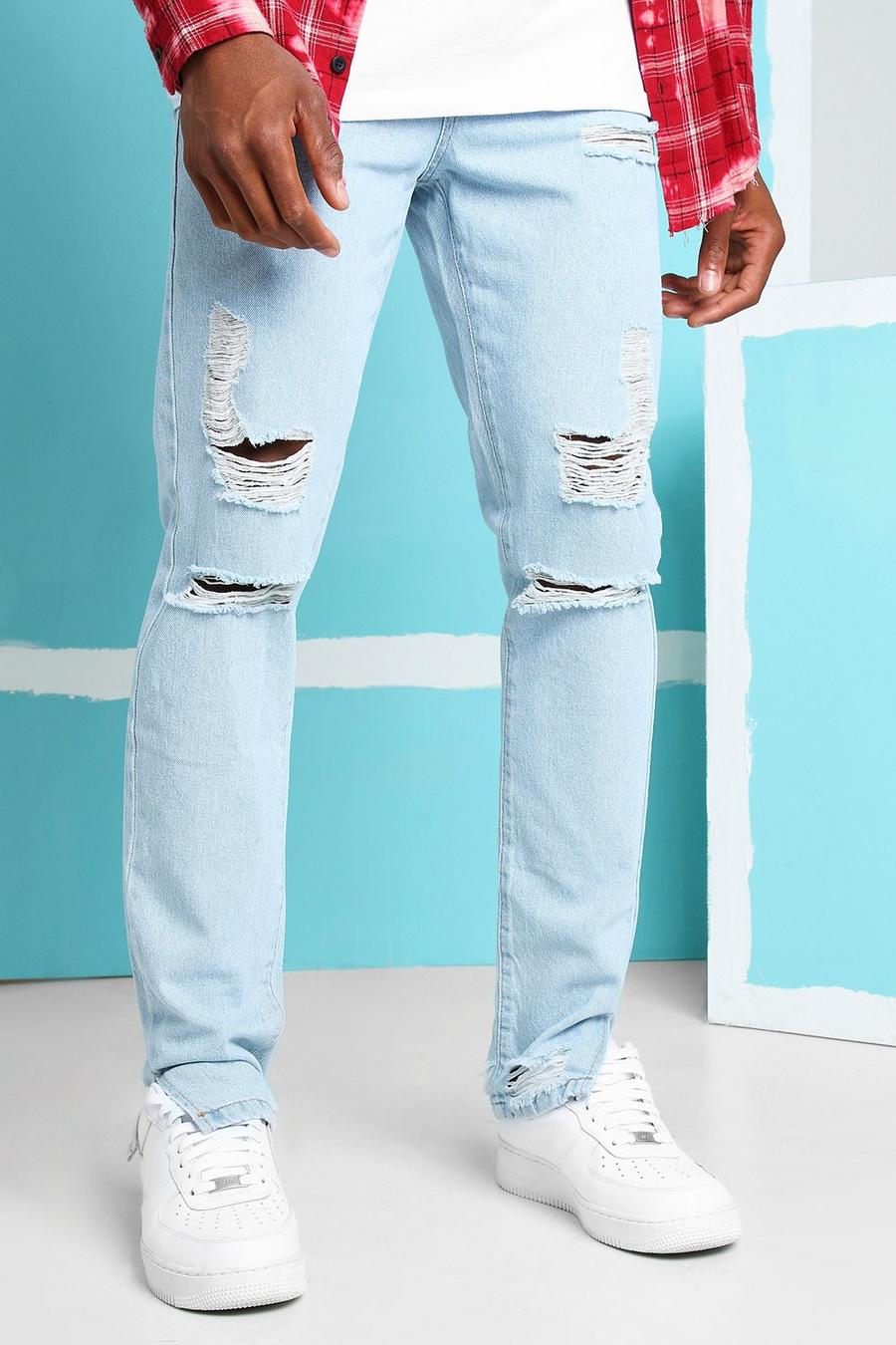 כחול קרח ג'ינס בגזרת סקיני עם מכפלת חצויה קשיחה וקרעים בברכיים image number 1