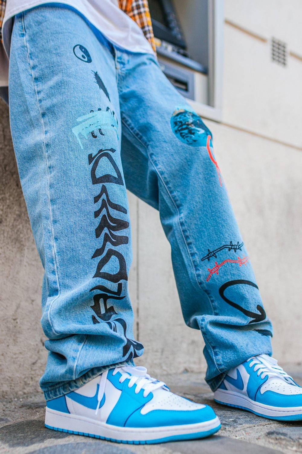 graffiti print jeans mens