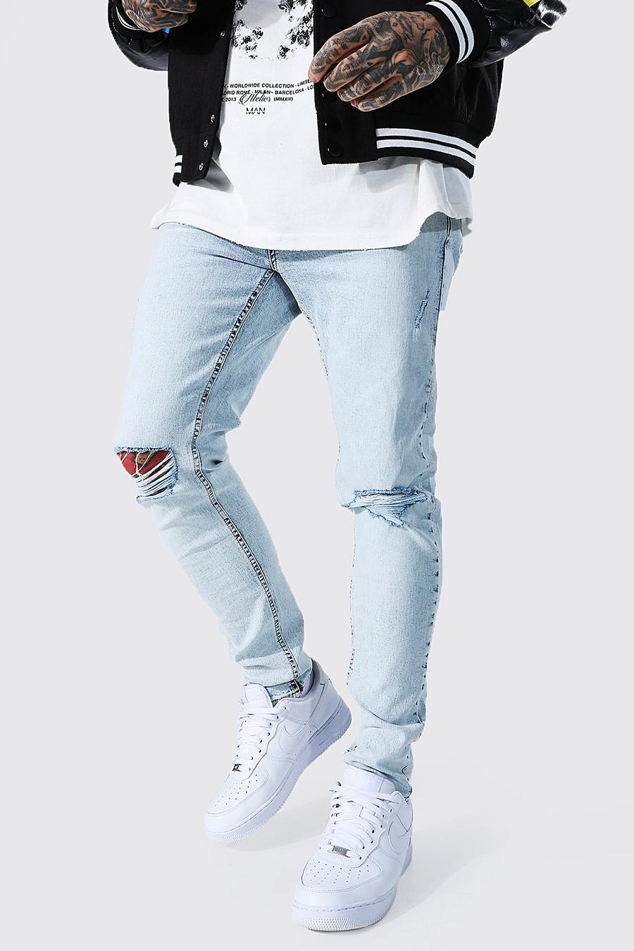 Ice blue Skinny jeans med slitna knän image number 1