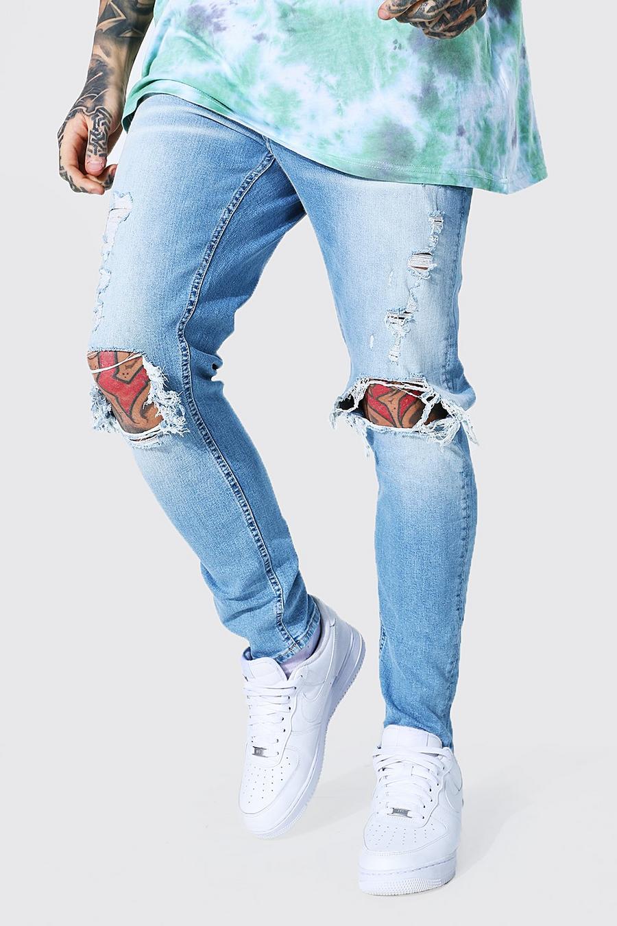 Mid blue Skinny Stretch Busted Knee Distressed Jeans image number 1