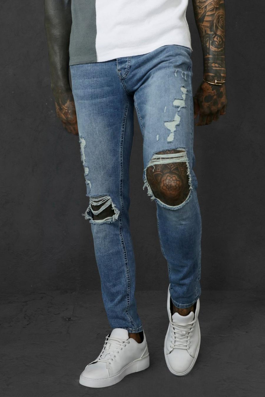 כחול וינטג' סקיני ג'ינס מבד נמתח עם קרעים בברכיים image number 1