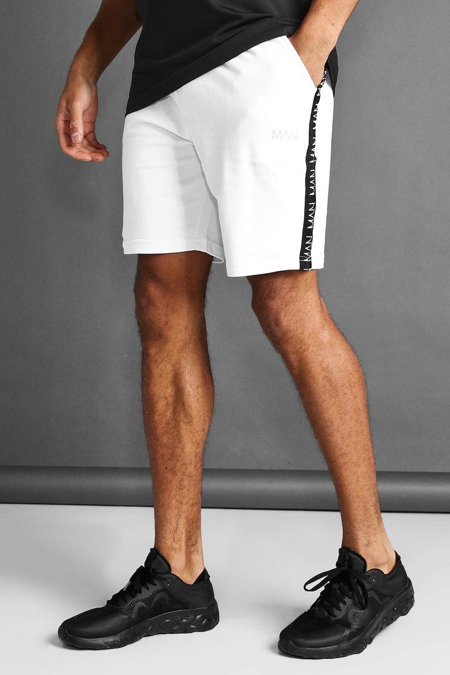 White MAN Mid Length Shorts With Tape Detail image number 1