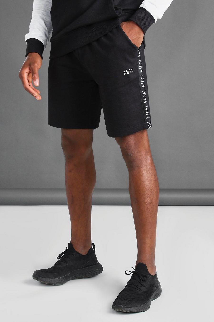 Black MAN Mid Length Shorts With Tape Detail image number 1