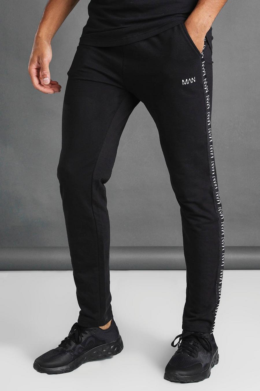 Tapered Fit Joggers With MAN Side Tape image number 1