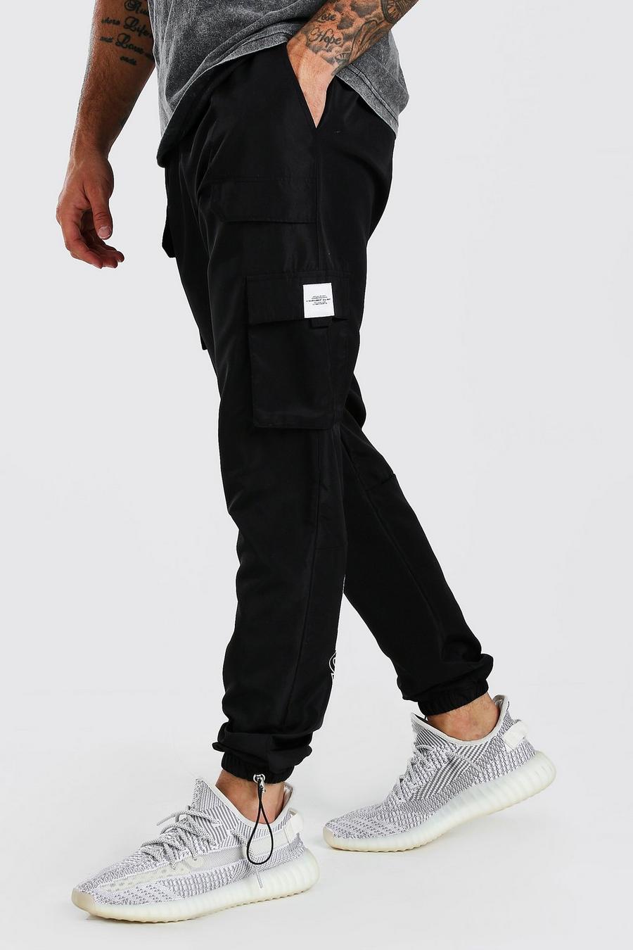 Black Official MAN Shell Cargo Trouser With Bungee Cords image number 1