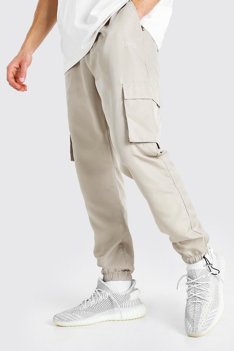 Pantaloni tuta MAN Official con rivestimento e coulisse, Pietra image number 1