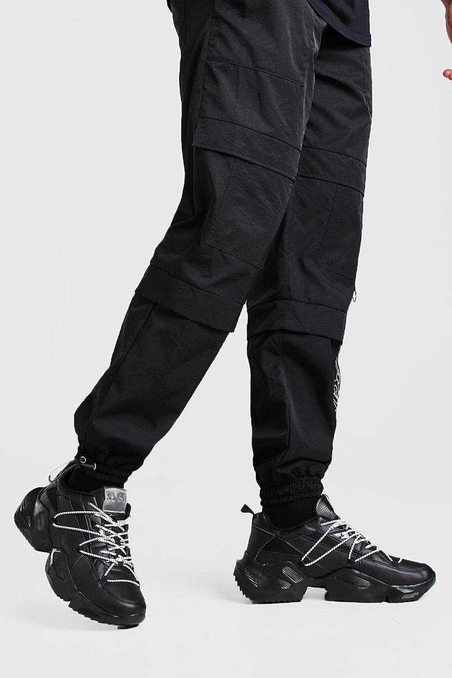 Black MAN Chunky sneakers med elastiska band i kontrastfärg image number 1