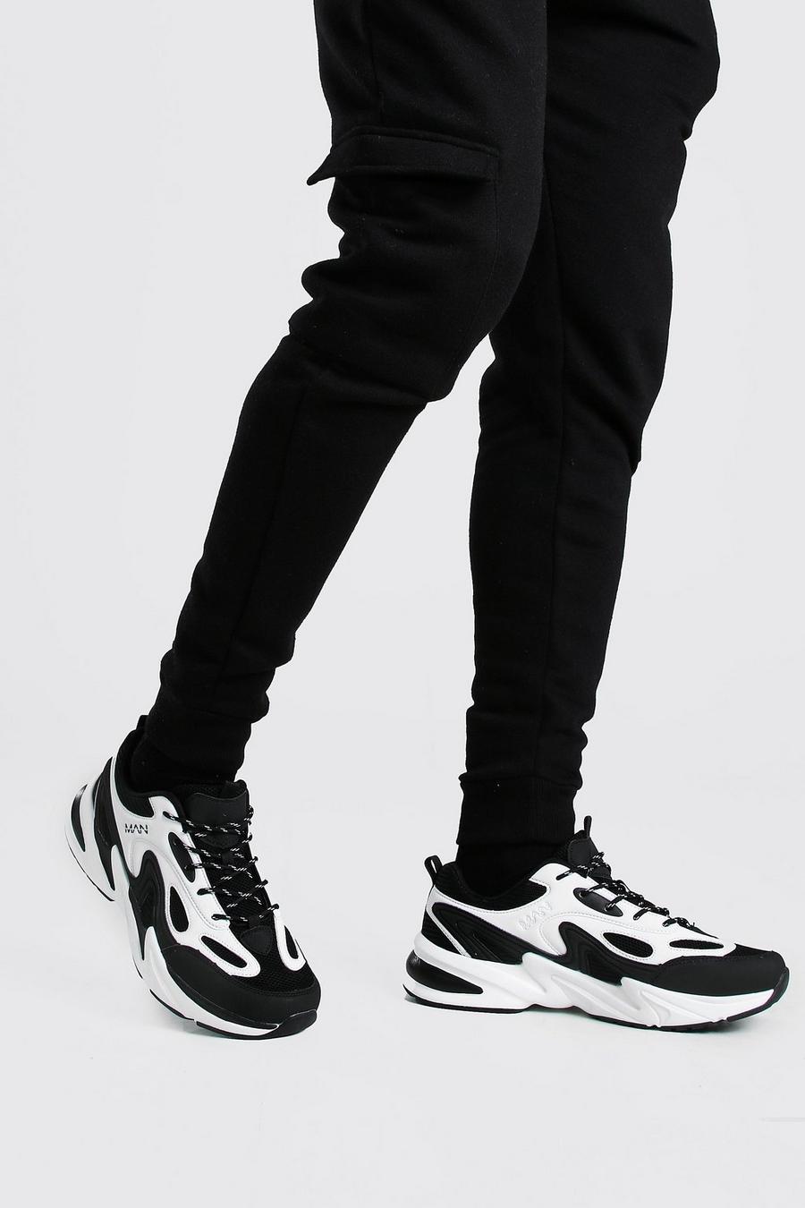 Black Man Stevige Sneakers Met Uitstekende Mesh Sok image number 1