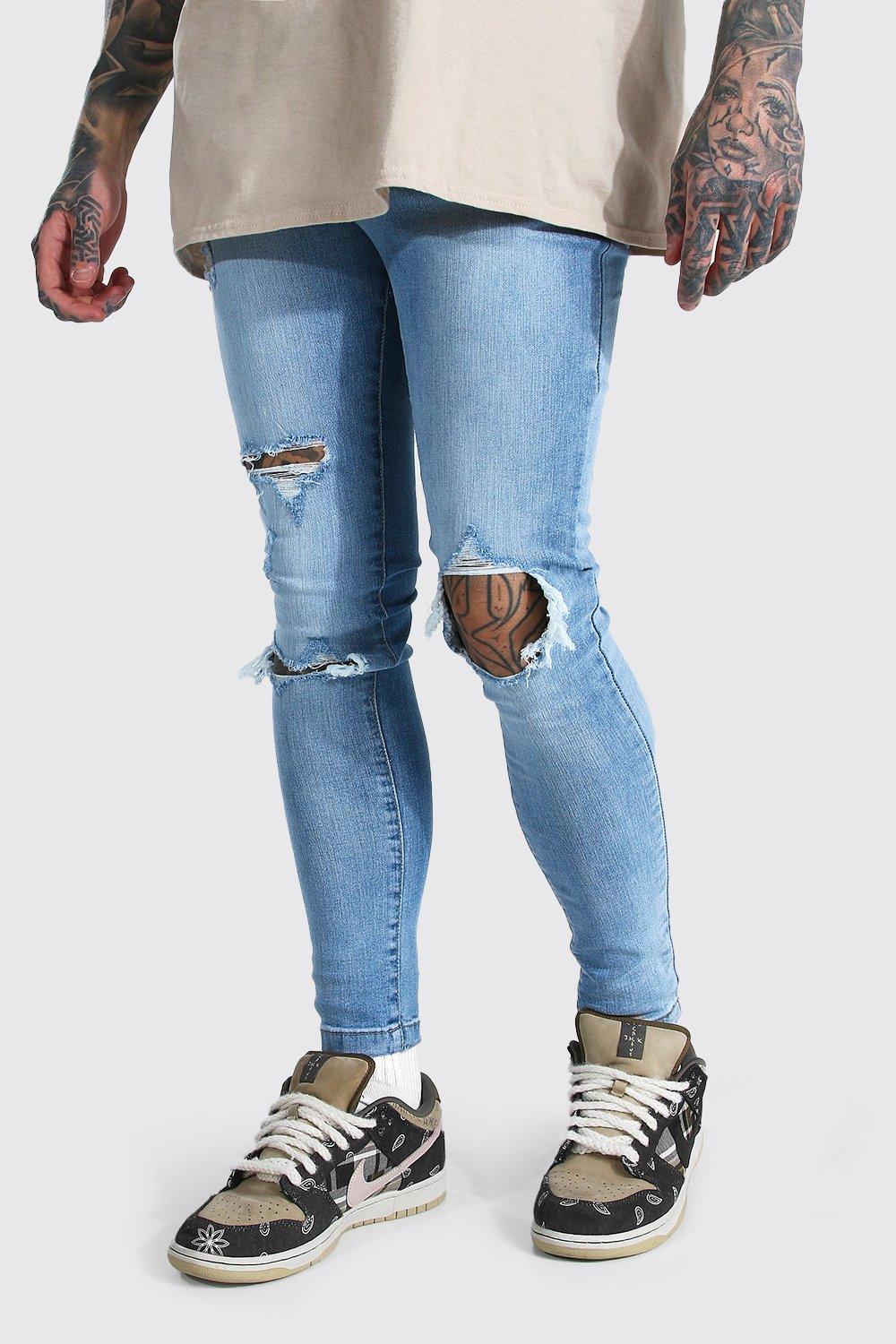 blue ripped knee jeans