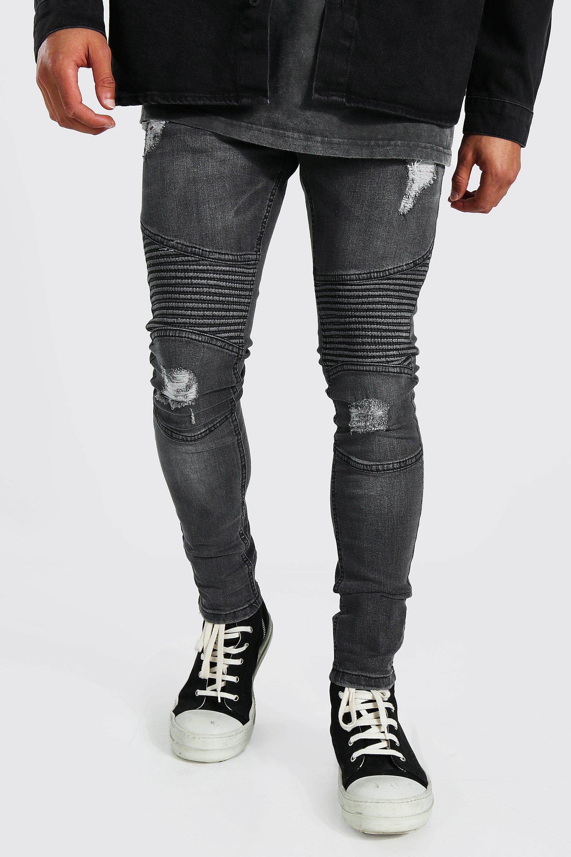 dark grey jeans with rips