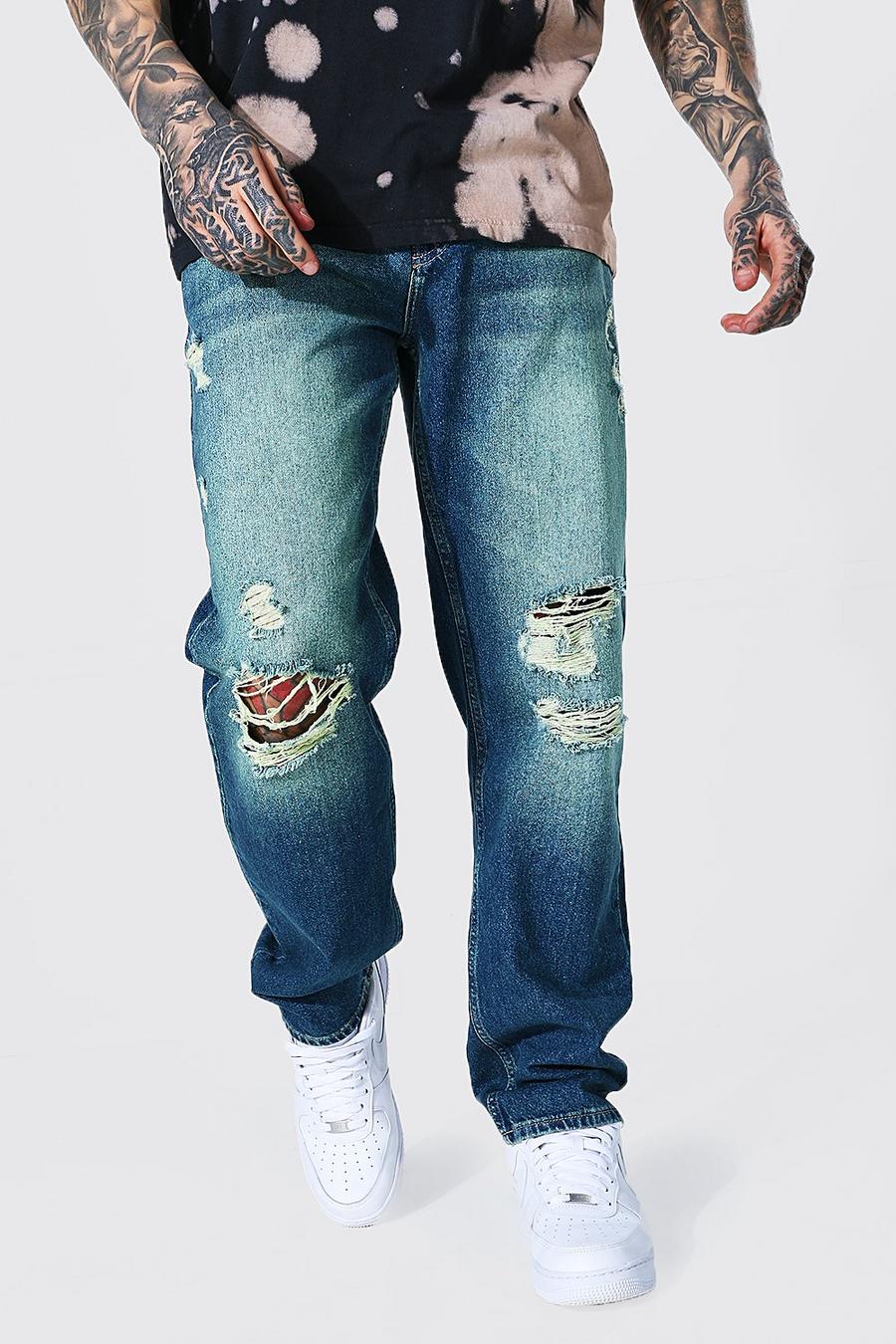 Vintage blue Jeans med slitna knän och ledig passform image number 1