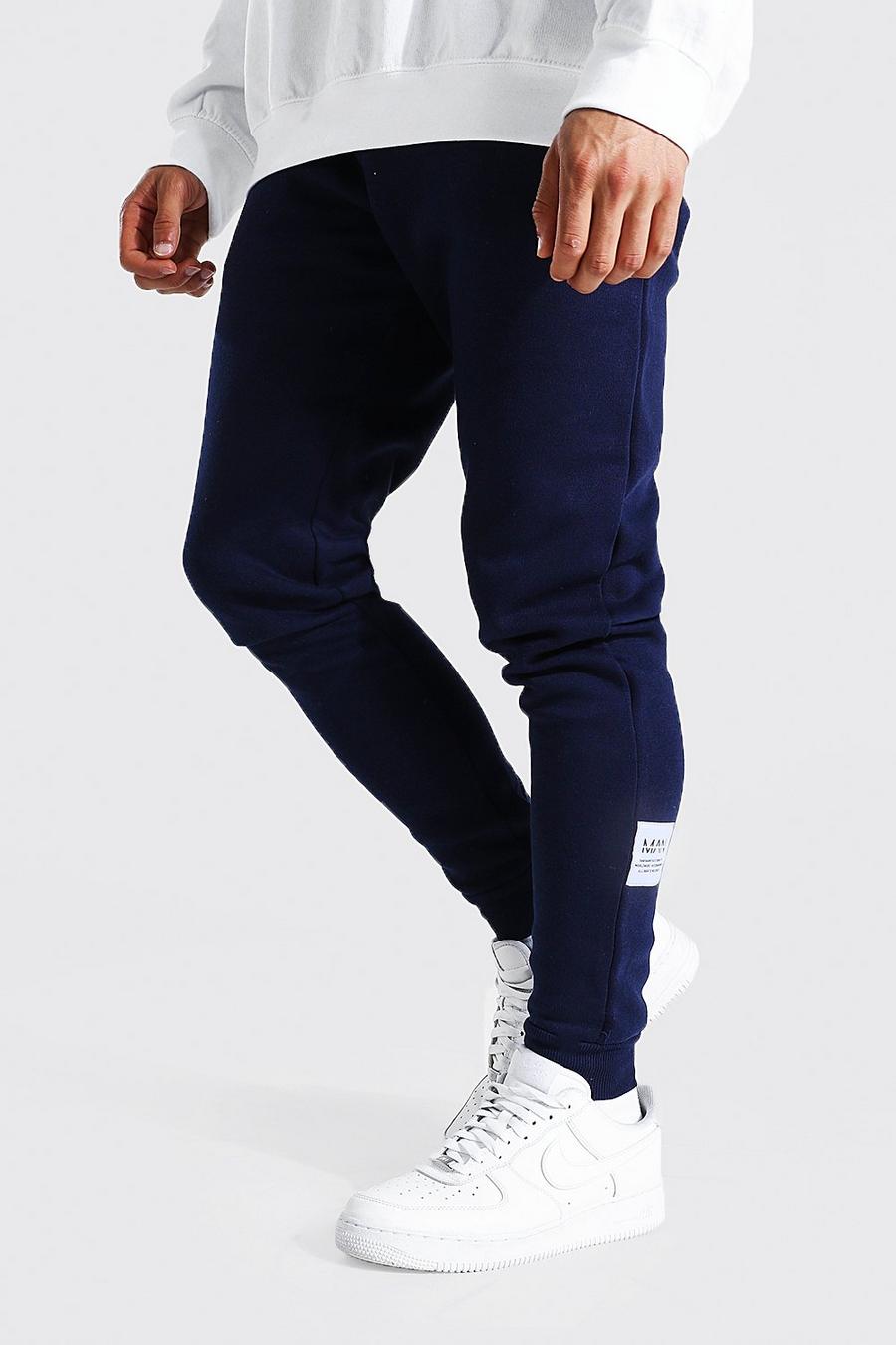 Pantalón deportivo pitillo con cordón elástico MAN, Azul marino image number 1
