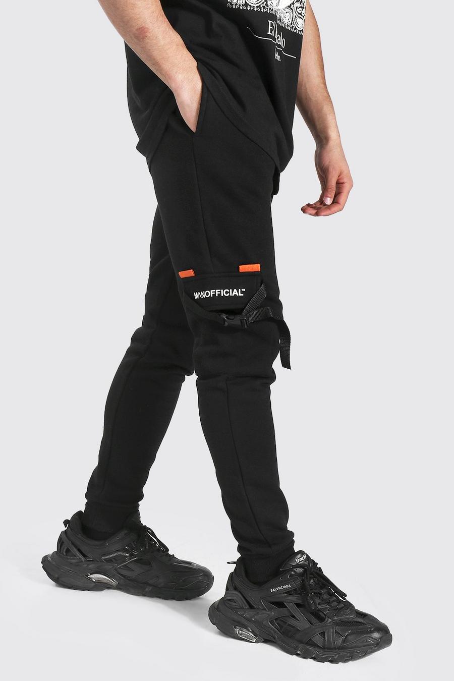 שחור מכנסי ריצה דגמ"ח מבד ג'רסי עם הדפס כיתוב Man Official image number 1