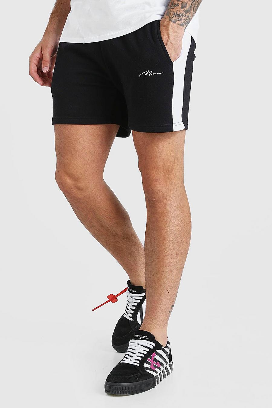 Jersey-Shorts mit seitlichen Einsätzen und MAN-Schriftzug, Schwarz image number 1