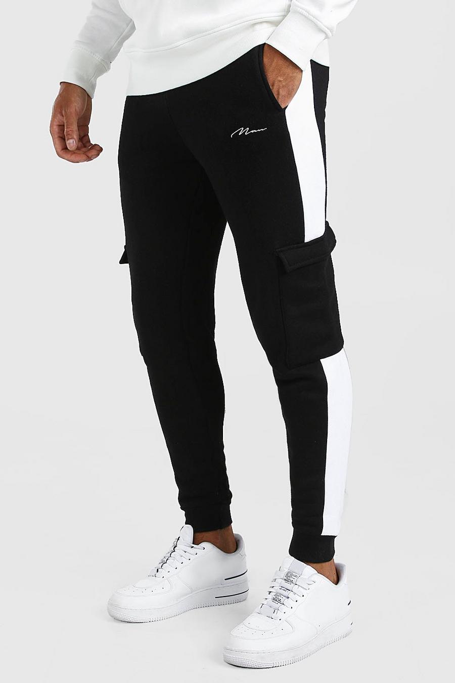 שחור מכנסי ריצה בגזרת סקיני עם חתימת Man ופאנל צדדי image number 1