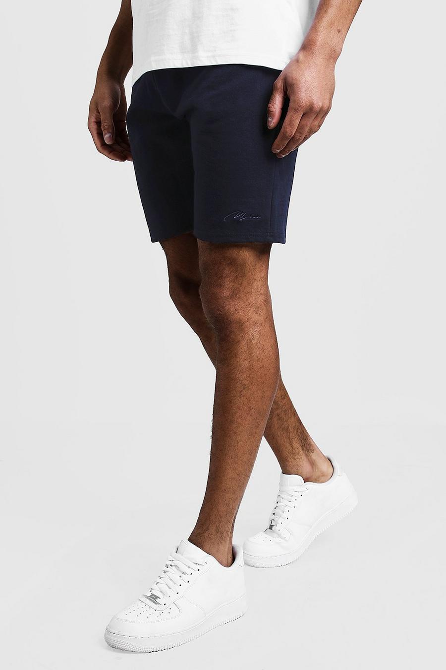Navy MAN Signature Mid Length Jersey Shorts image number 1