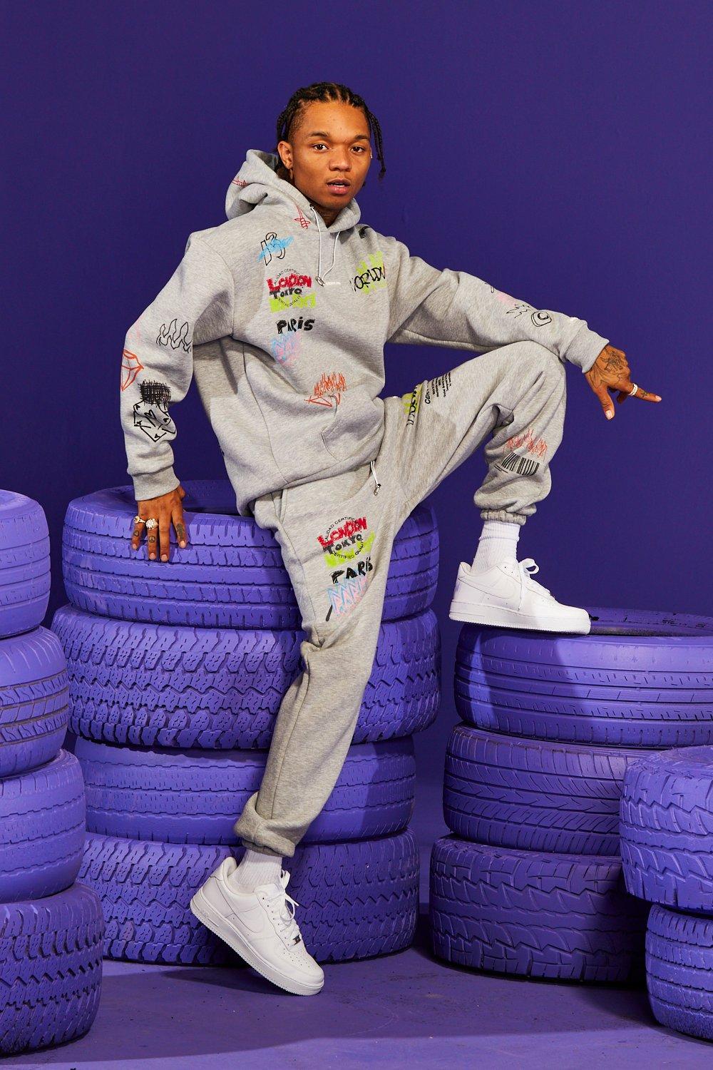 Men's Official Worldwide Printed Tracksuit | Boohoo UK