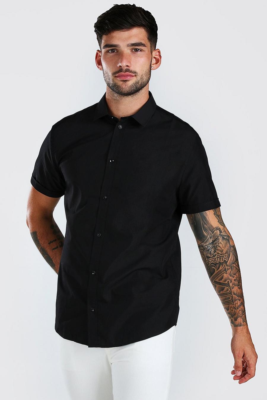 Black svart Kortärmad skjorta i regular fit