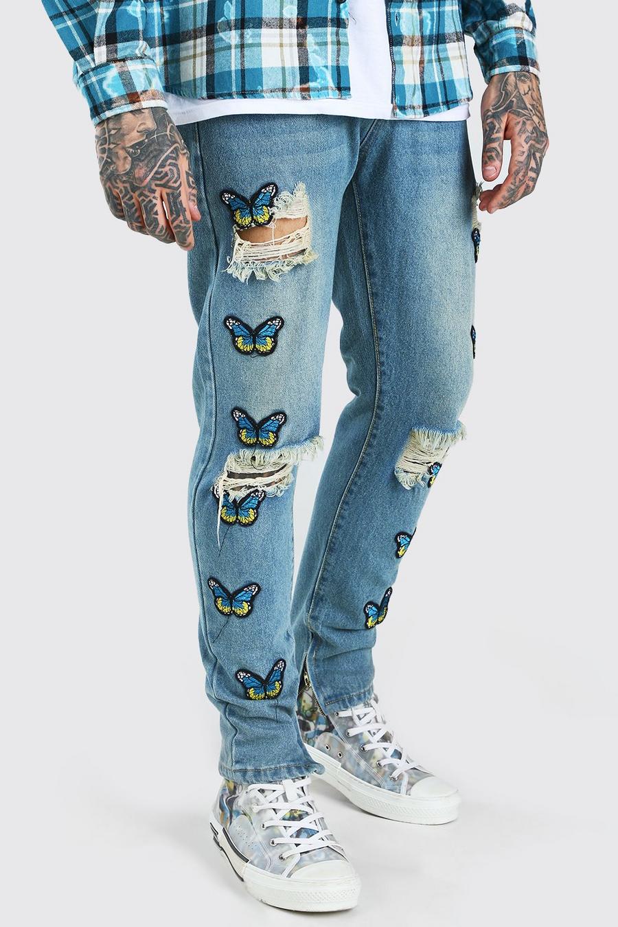 כחול בהיר מכנסי ג'ינס קשיחים בגזרת סקיני עם אפליקציית תג פרפרים image number 1
