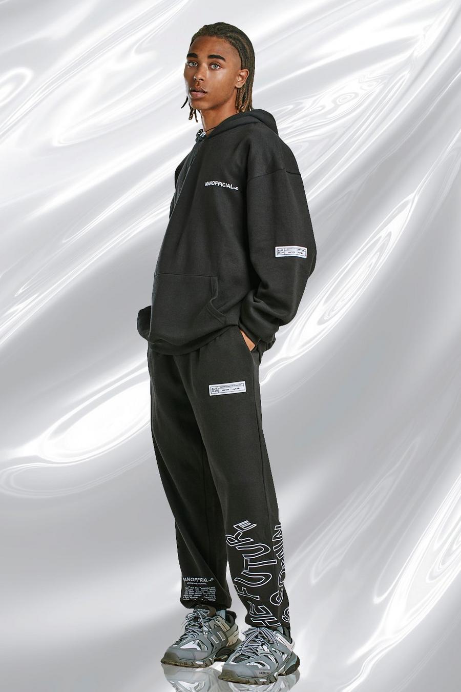 Black MAN Official Oversized Hooded Graphic Tracksuit image number 1