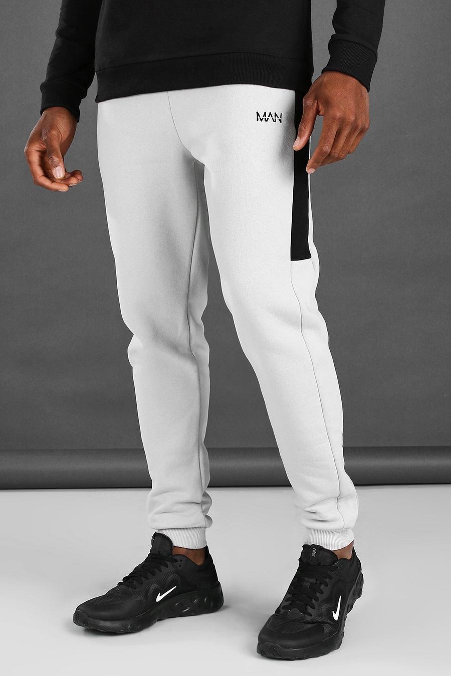 Pantaloni tuta MAN skinny in jersey con pannelli laterali image number 1