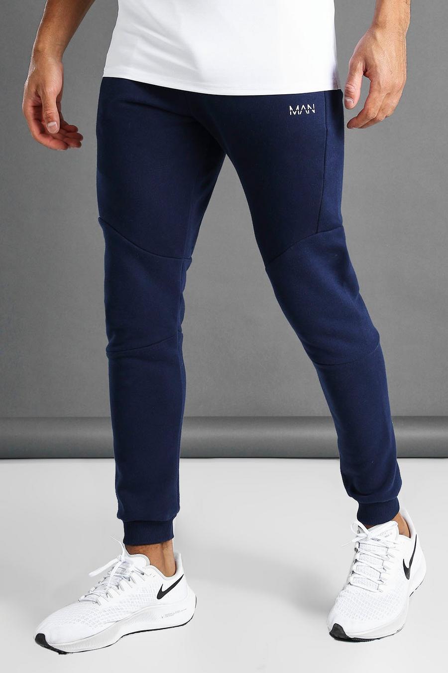 Pantalones de correr ajustados con ribetes para hombre, Azul marino image number 1