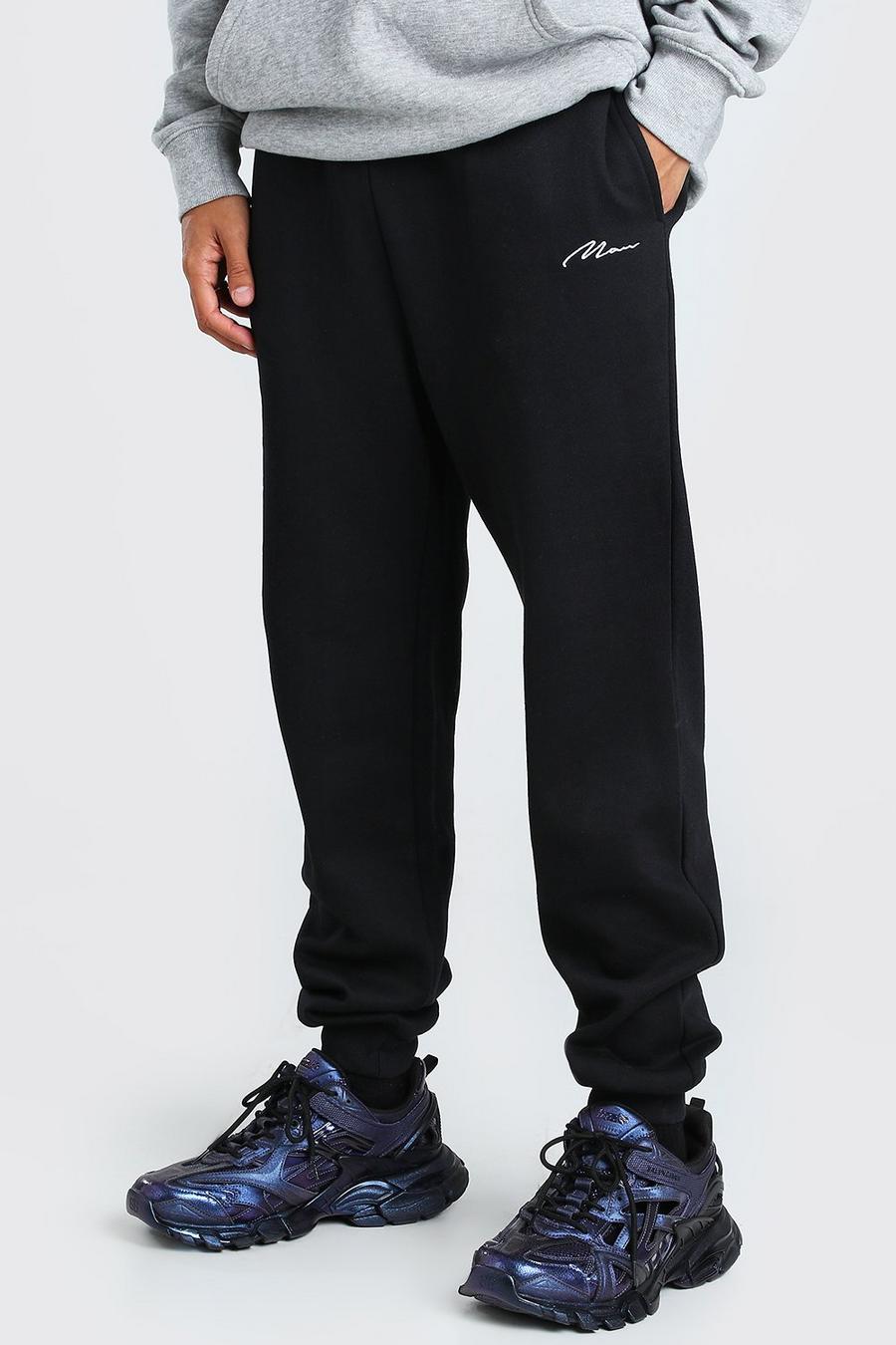 Conjunto de pantalones de correr holgados con la marca bordada para hombre, Negro image number 1