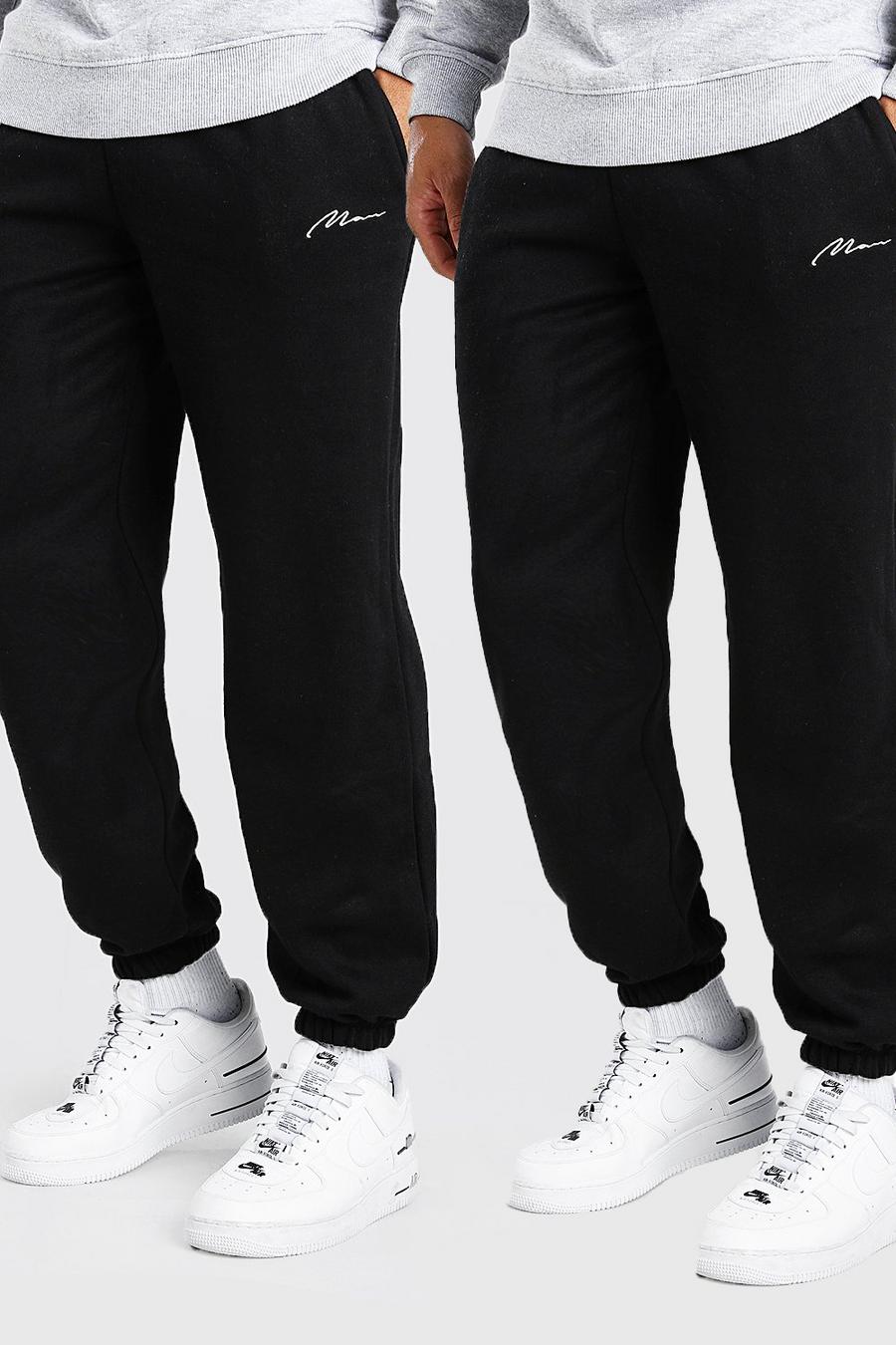 Pack de dos pantalones de correr holgados de la marca para hombre, Negro image number 1