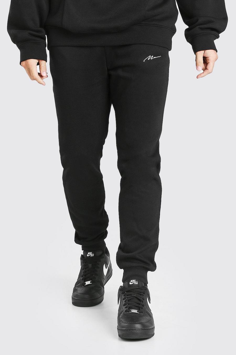 Black Slim Fit Man Signature Embroidered Track Pant image number 1