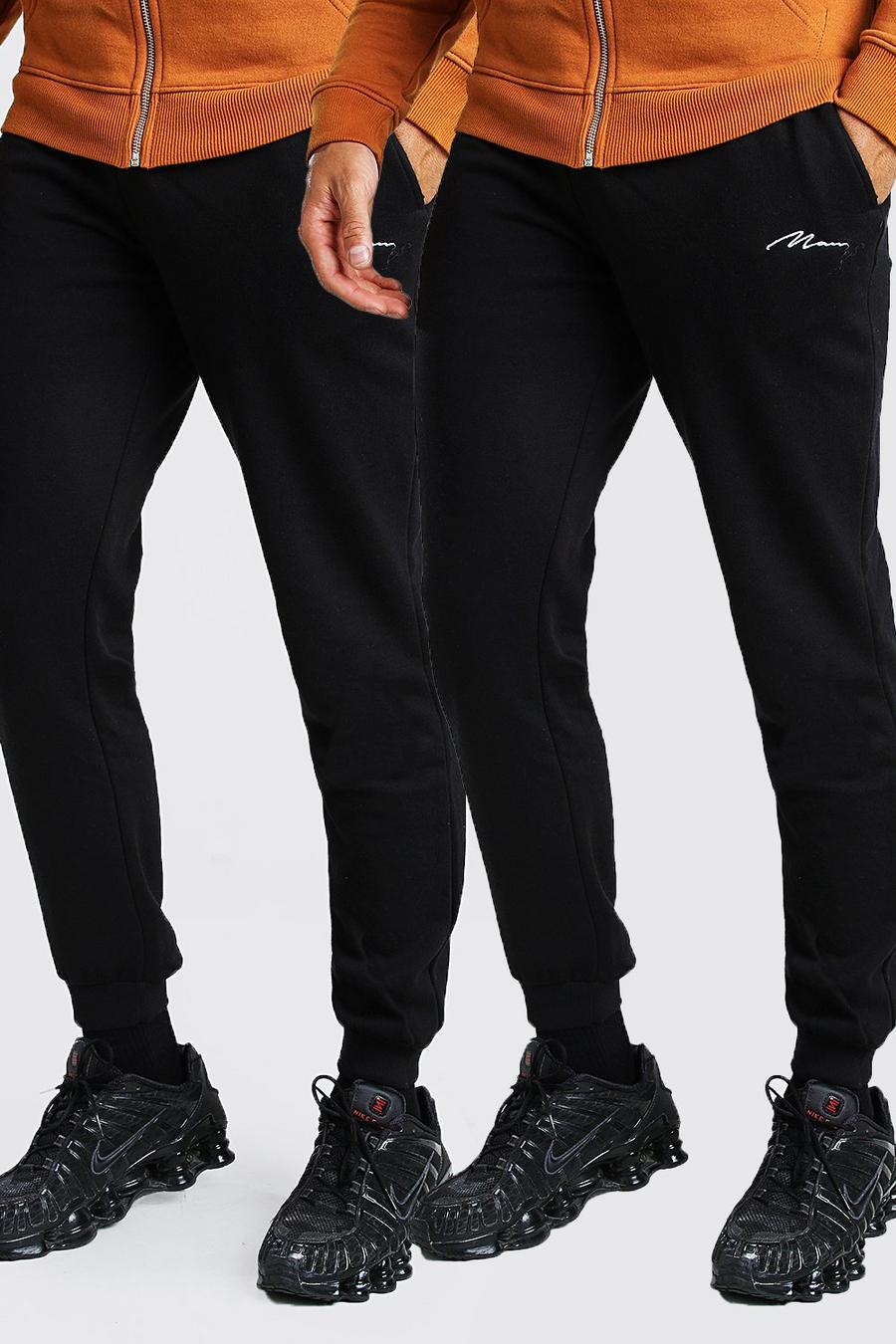 Confezione con 2 pantaloni tuta slim fit con scritta MAN, Nero image number 1