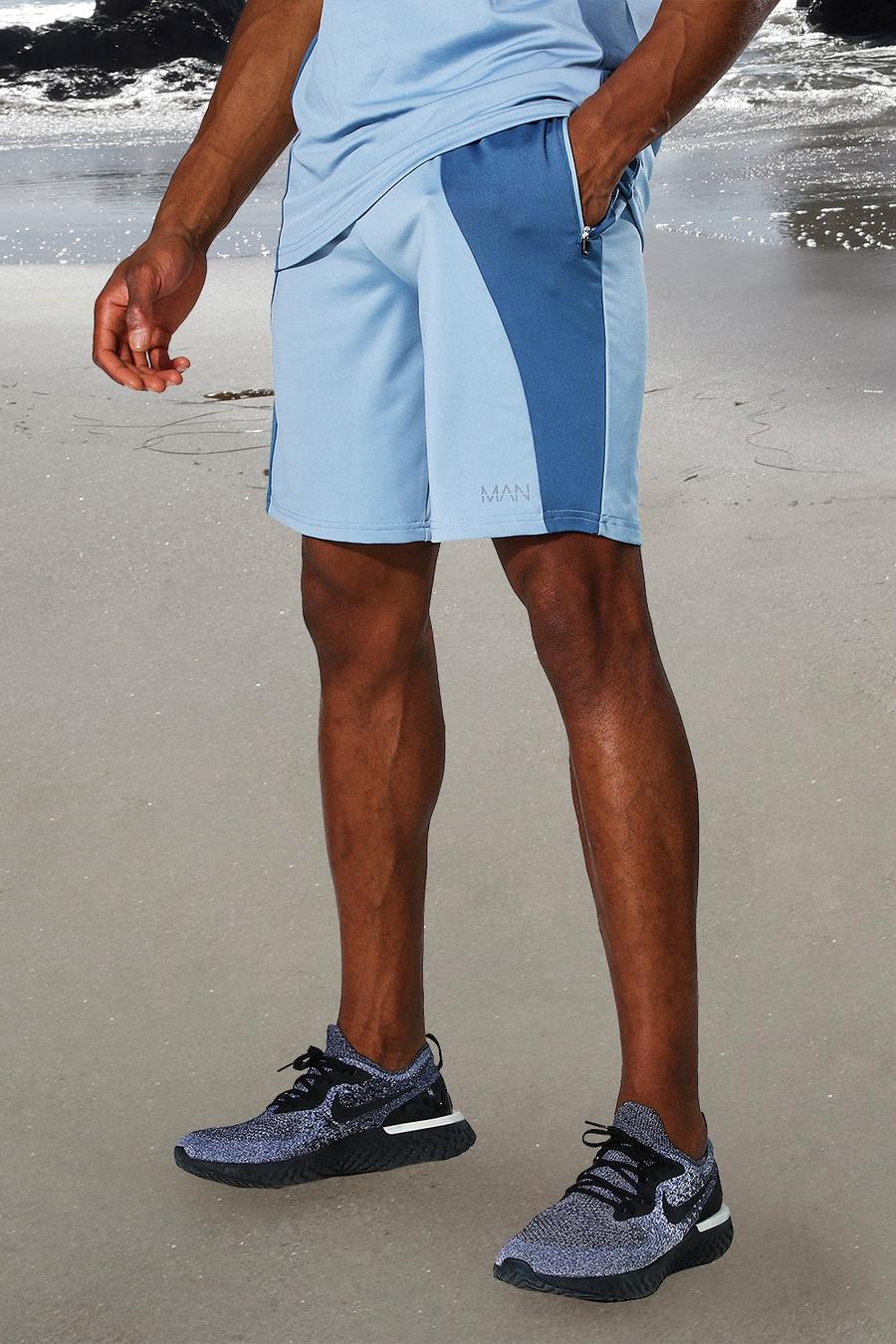 Dusty blue MAN Active Shorts med blockfärger image number 1