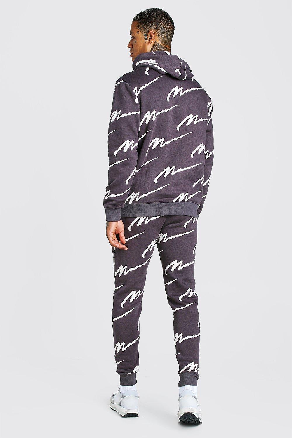 All over man printed hooded tracksuit black best sale