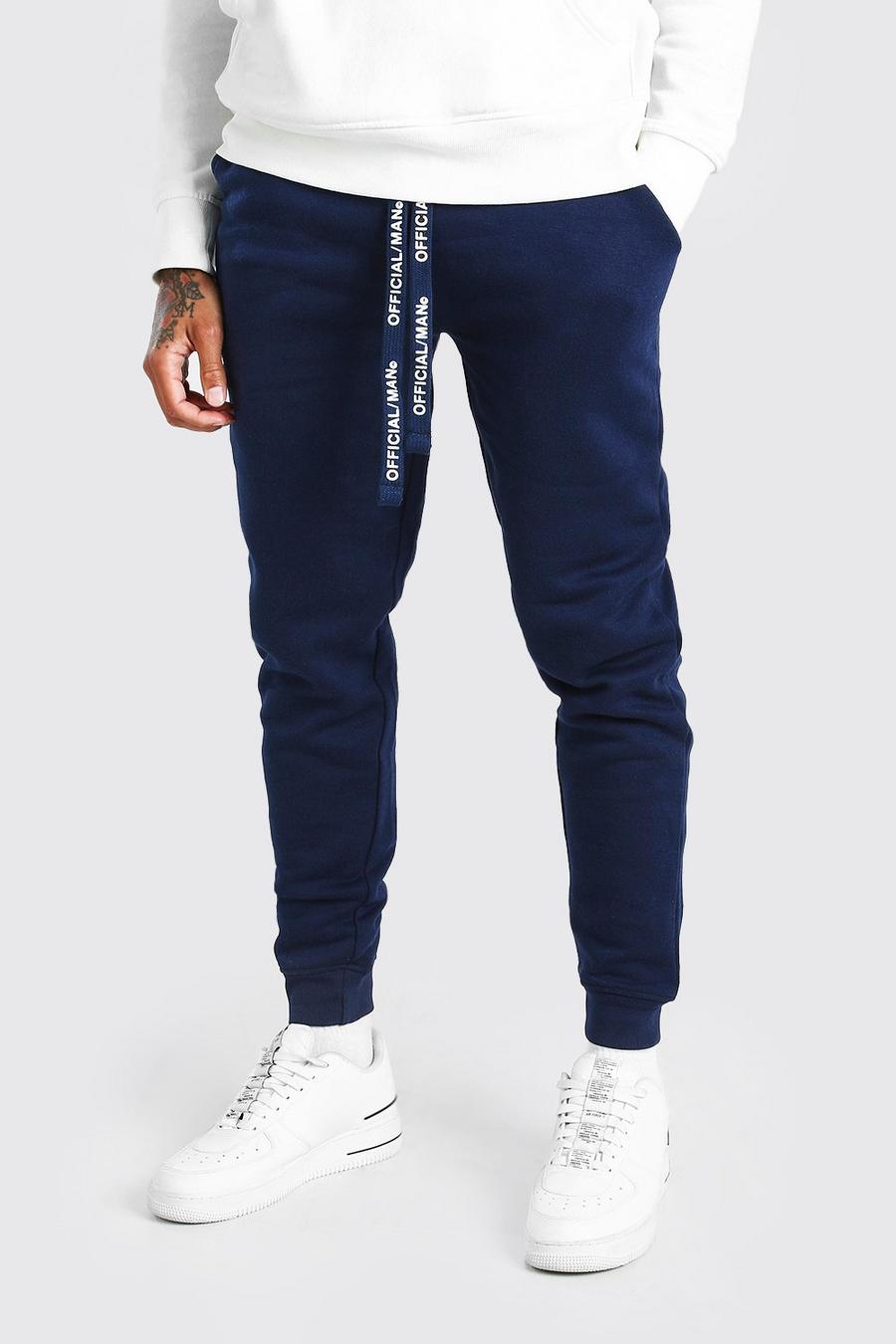 Skinny Fit Jogginghosen mit MAN-Zugbändern, Marineblau image number 1