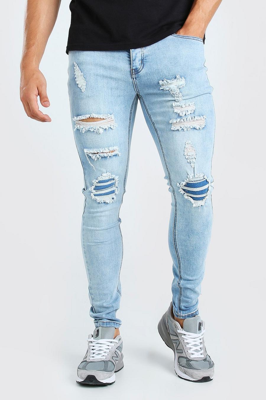 כחול אפור סופר סקיני ג'ינס עם קרעים וטלאים image number 1