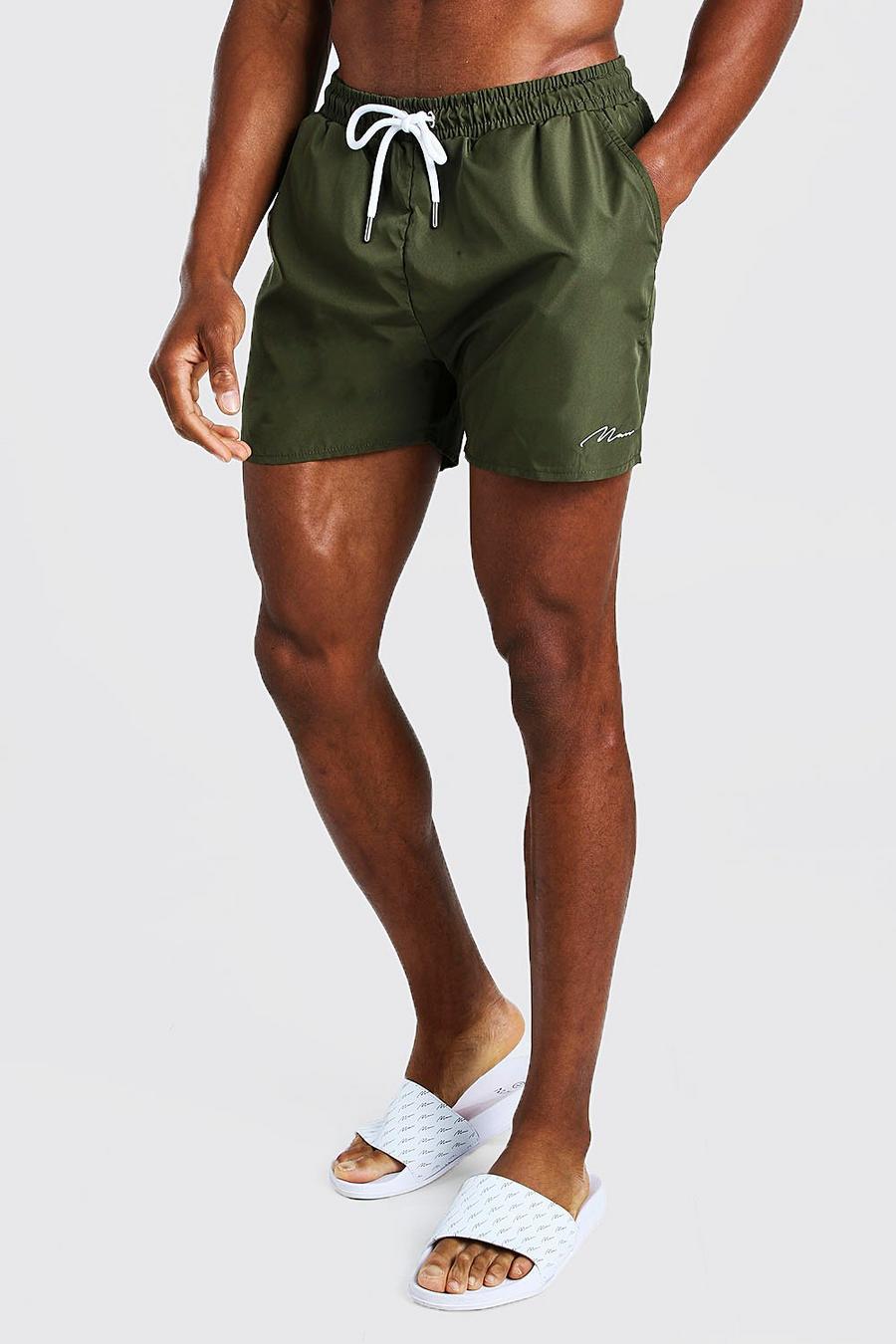 Pantalones de largo medio con cinta de la marca MAN, Verde image number 1