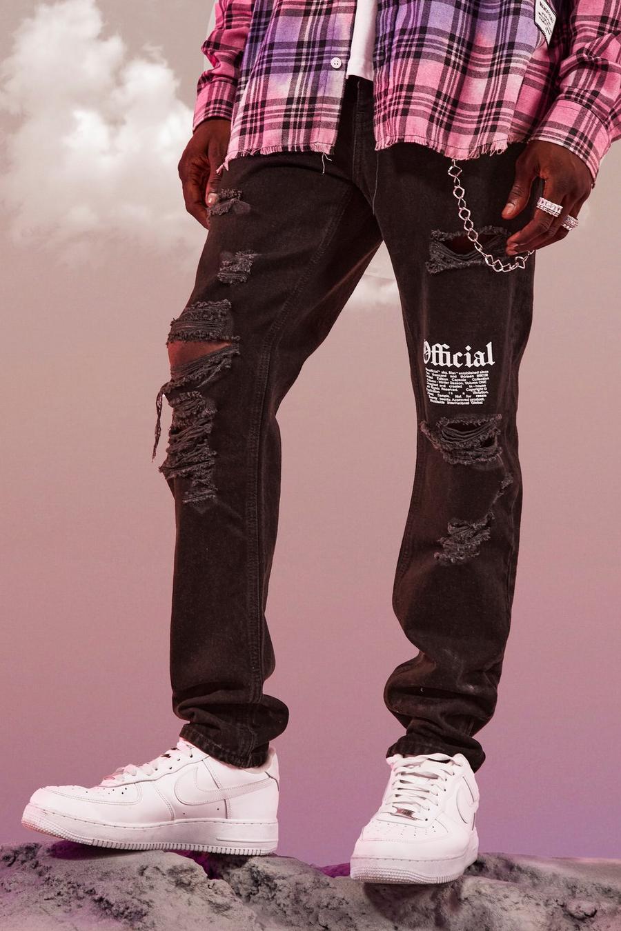 סקיני ג'ינס מבד סטרץ' עם קרעים בברכיים והכיתוב Official MAN image number 1