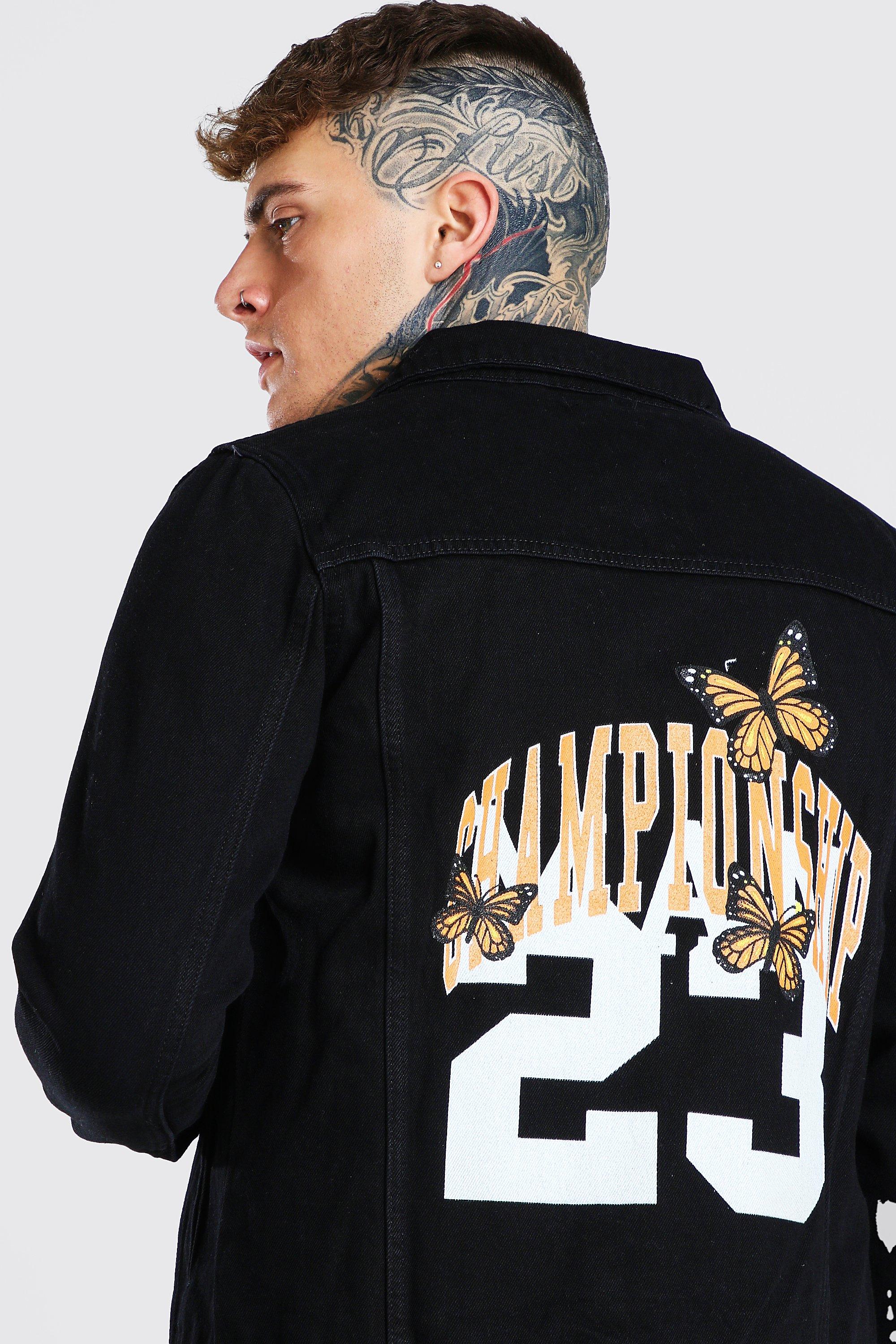 Black denim jacket with 2025 design on the back