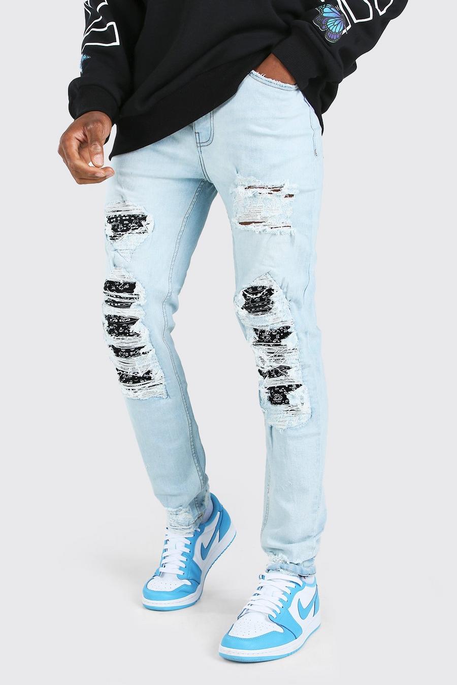 Skinny Fit Biker Jeans mit Rissen und Flicken und Bandana-Print, Eisblau image number 1