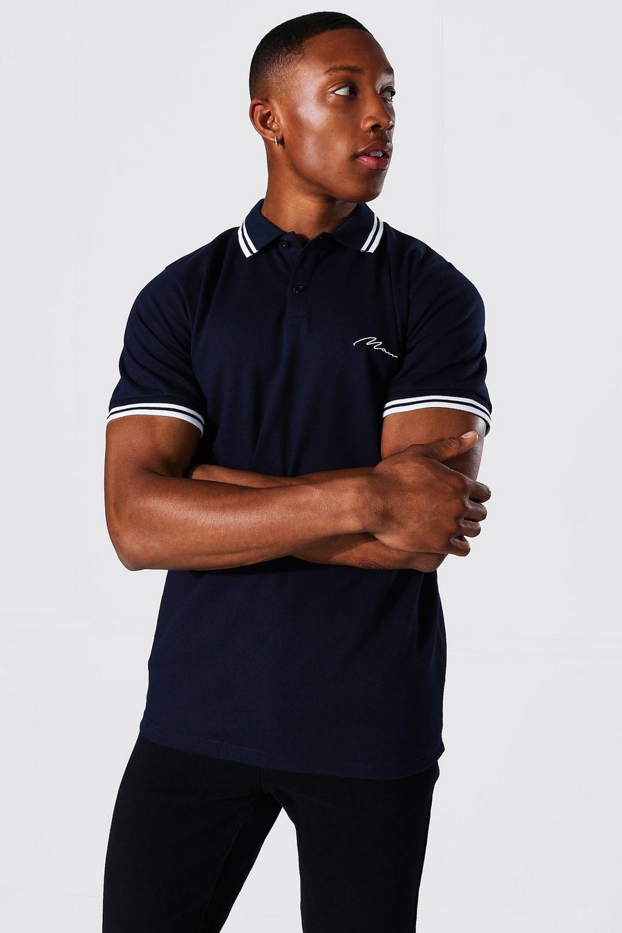 MAN Signature Piqué-Poloshirt mit schmalen Saumborten, Marineblau image number 1