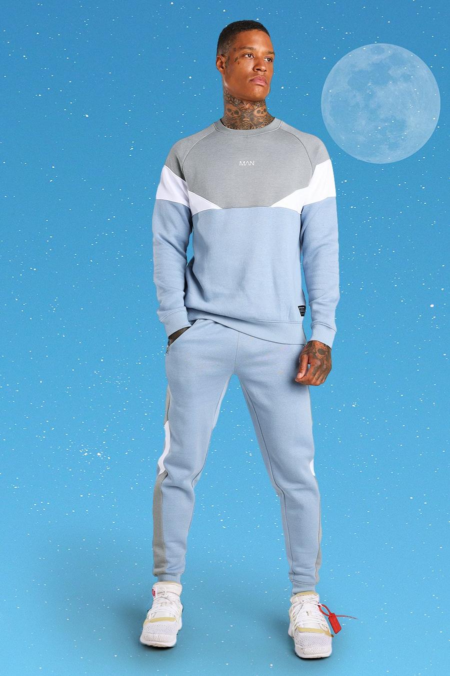Sweater-Jogginganzug im Colorblock Design und MAN-Print, Blau image number 1