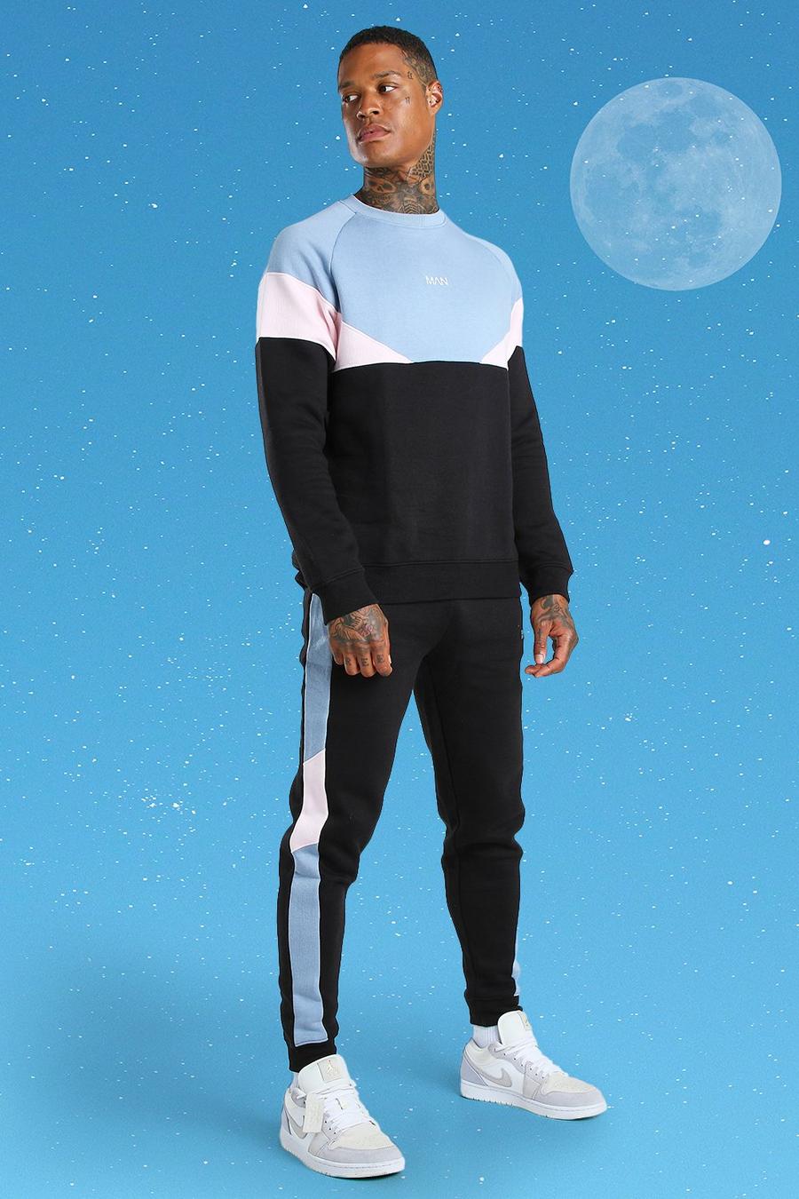 Sweater-Jogginganzug im Colorblock Design und MAN-Print, Schwarz image number 1