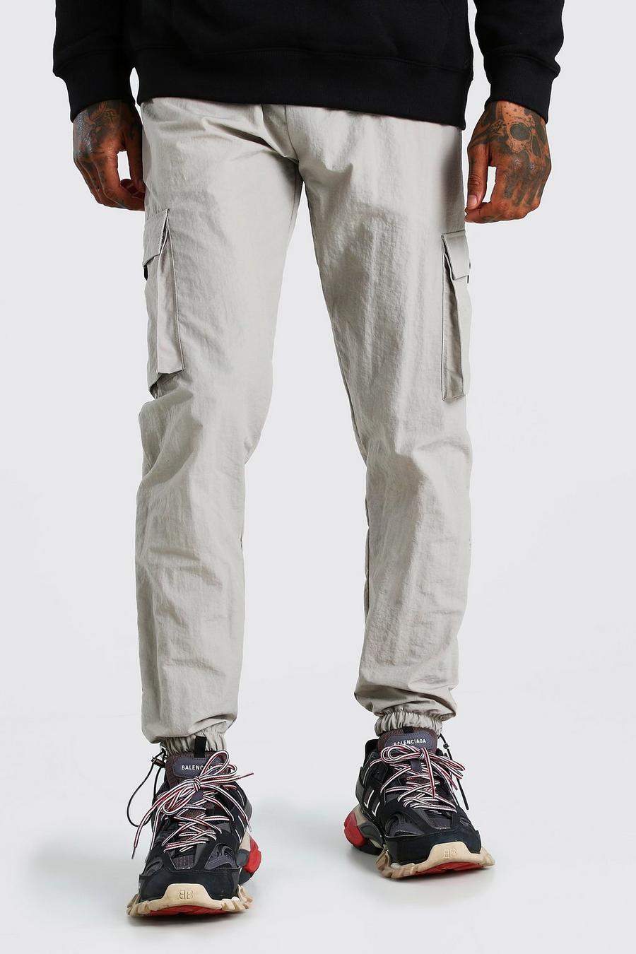 Stone Peached Shell Cargo Pants With Bungee Cords image number 1