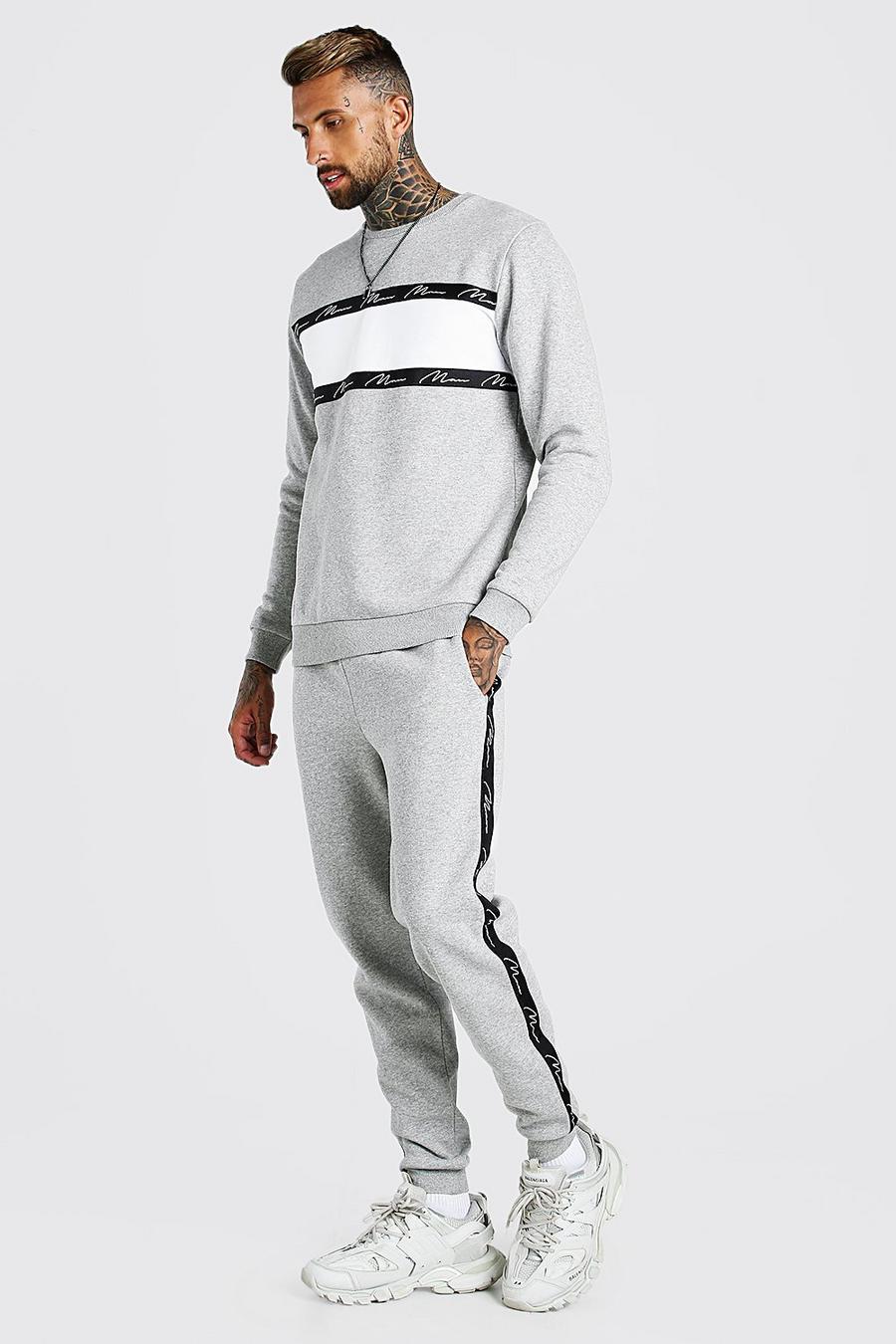 Trainingsanzug mit charakteristischem Streifen im Colorblock-Design und „MAN“-Print, Grau meliert grey image number 1