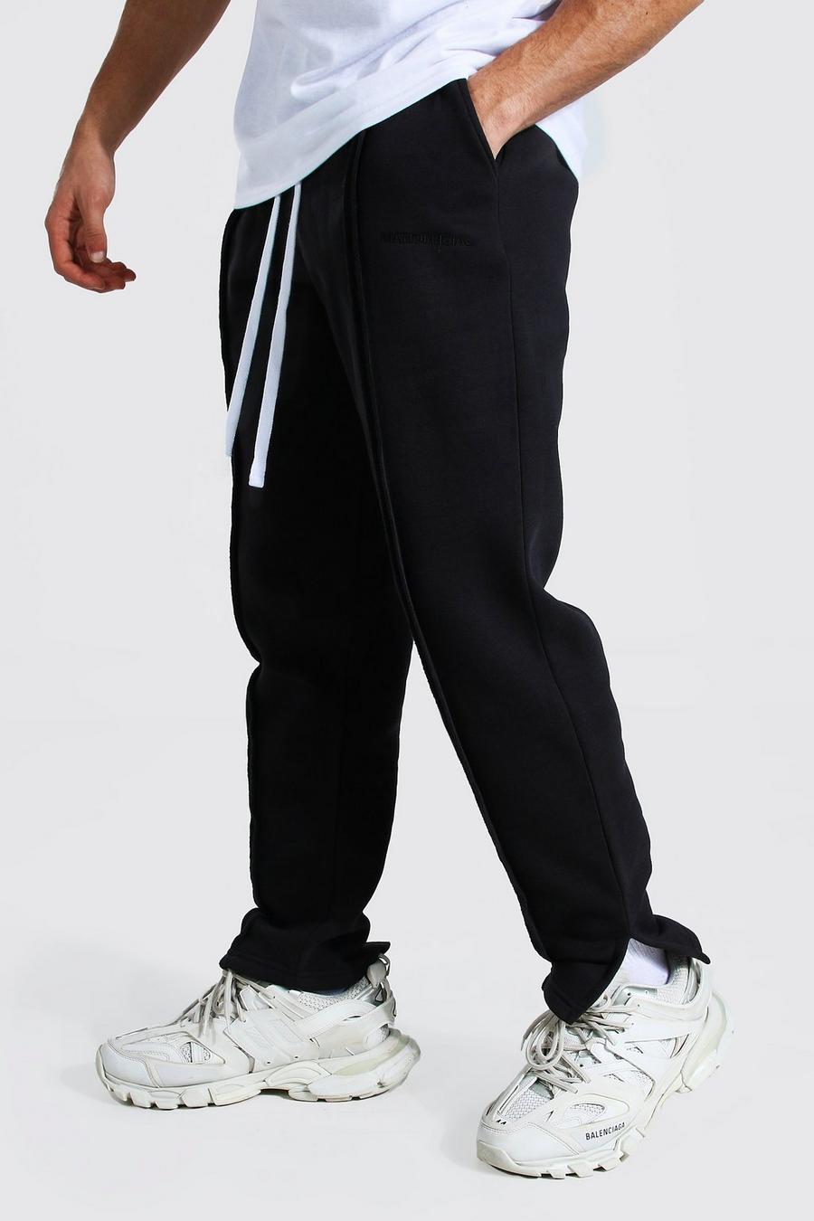 Pantalones de correr holgados con bajo dividido MAN Official, Negro image number 1