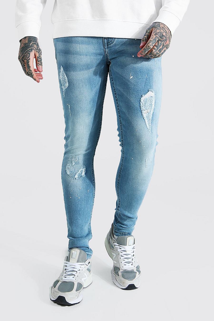 כחול קרח ג'ינס בגזרת סופר סקיני עם קרעים וכתמי צבע image number 1
