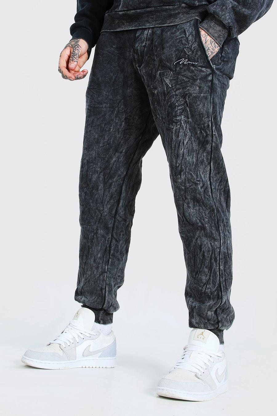 Pantaloni tuta taglio regular effetto consumato con firma MAN, Grigio image number 1