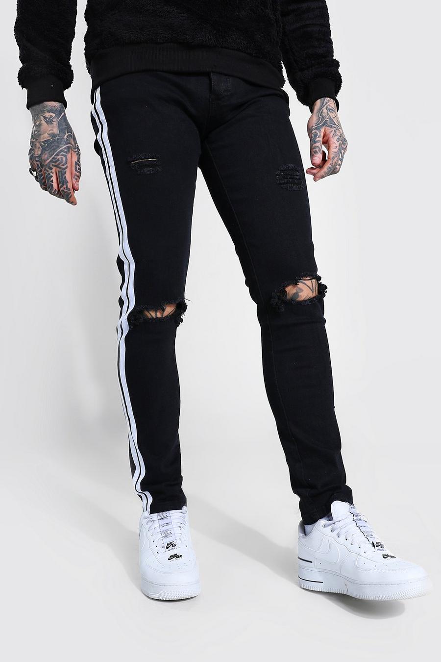Washed black Skinny jeans med slitage och kantband image number 1