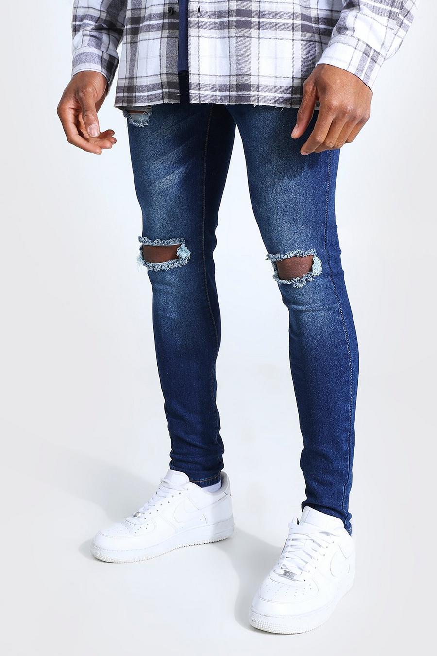אינדיגו דהוי מכנסי ג'ינס מולבנים בגזרת סופר סקיני עם קרעים  image number 1